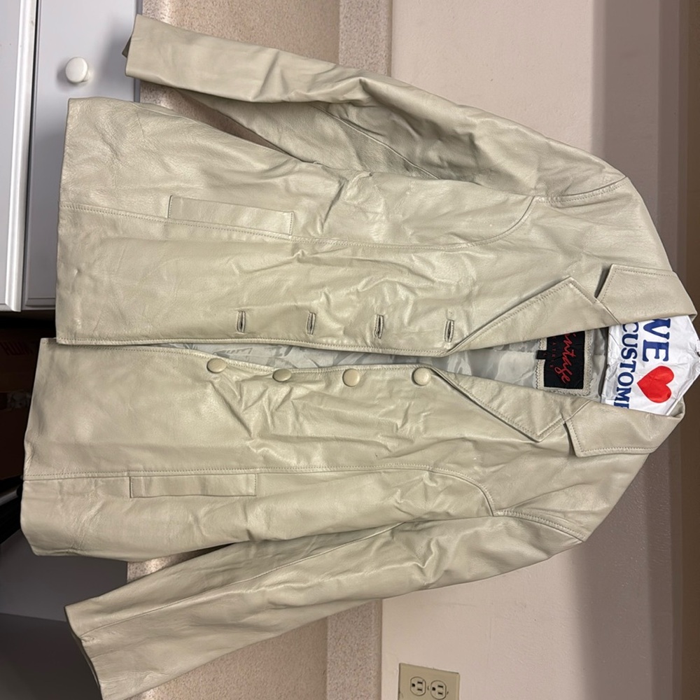 Woman’s leathered jackets off white in color